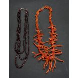 A red coral necklace of graduated design,