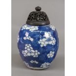 A Chinese blue and white ginger jar, painted with prunus, 13cm high,