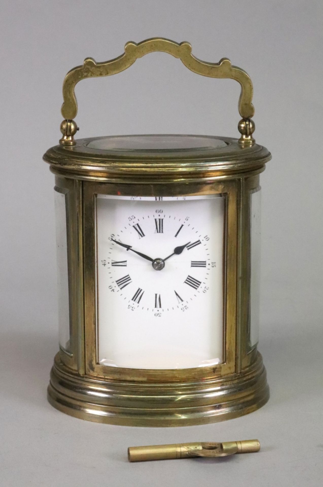 An oval brass cased carriage clock, 20th century, - Image 2 of 3