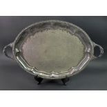 A George IV style oval two handled electroplate tray, with fruiting vine cast border and handles,