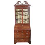 A George III mahogany bureau bookcase,