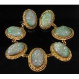 A carved jadeite sectional necklace brooch combination,