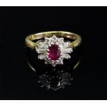 An 18ct gold, ruby and diamond ring, of cluster design,