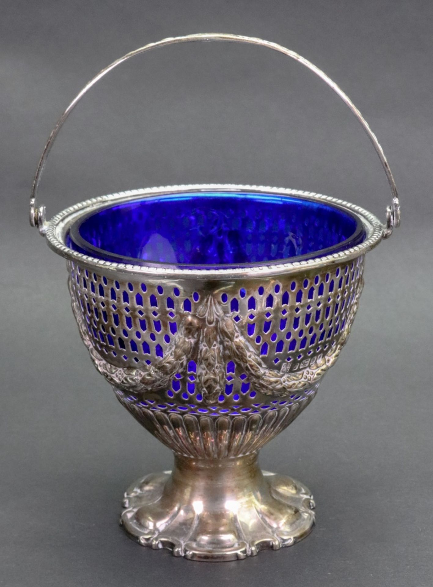 A Victorian silver sugar basket, Sheffield 1881, makers mark CB EP,