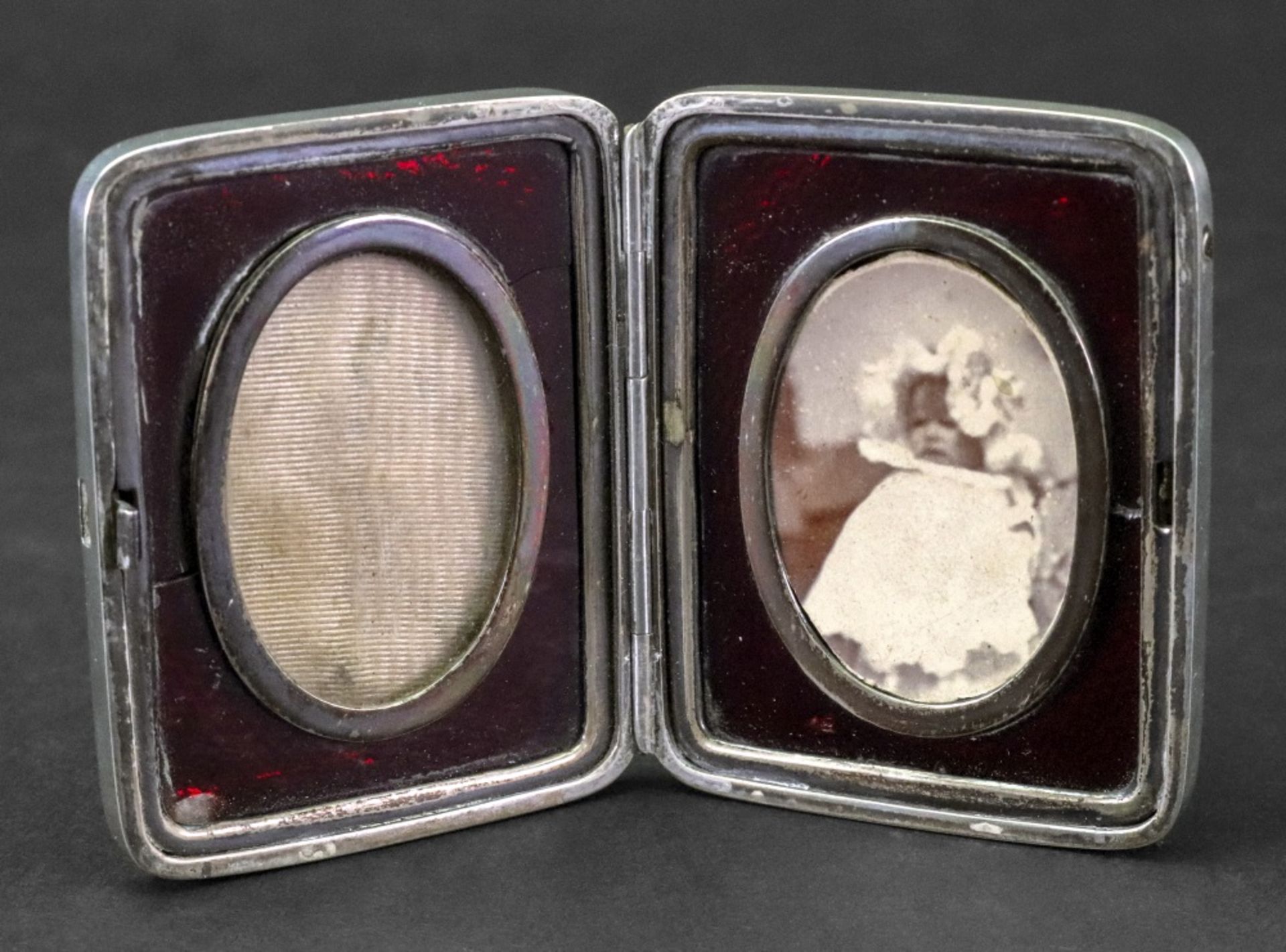 A Victorian silver double photograph frame, Andrew Barrett & Sons, London 1895,