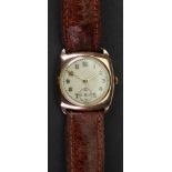 A 9ct rose gold cased wristwatch, the white enamelled dial with applied gilt metal Arabic numerals,