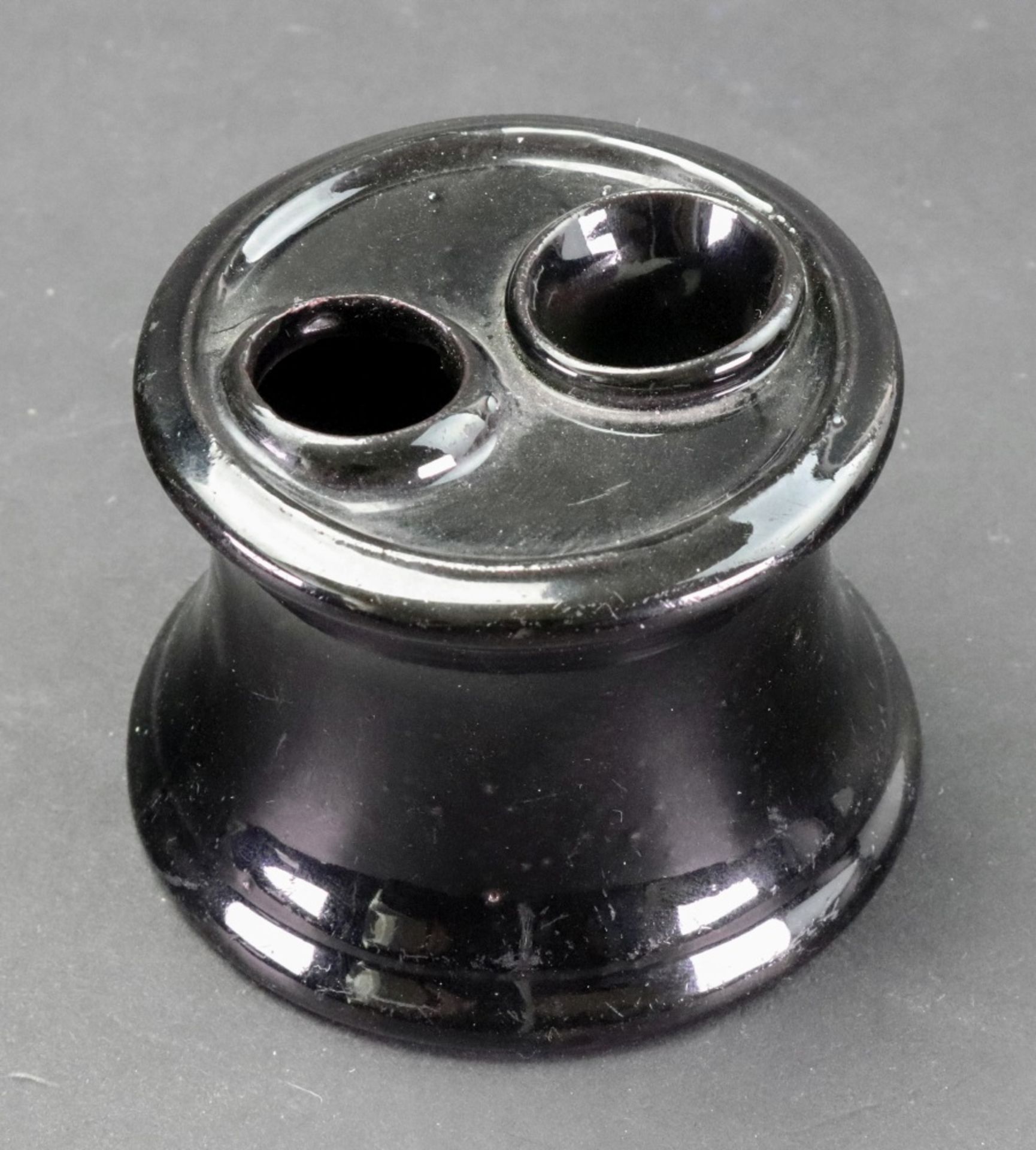 A Staffordshire 'Jackfield' style inkwell, circa 1760-70, of capstan form, - Image 2 of 2