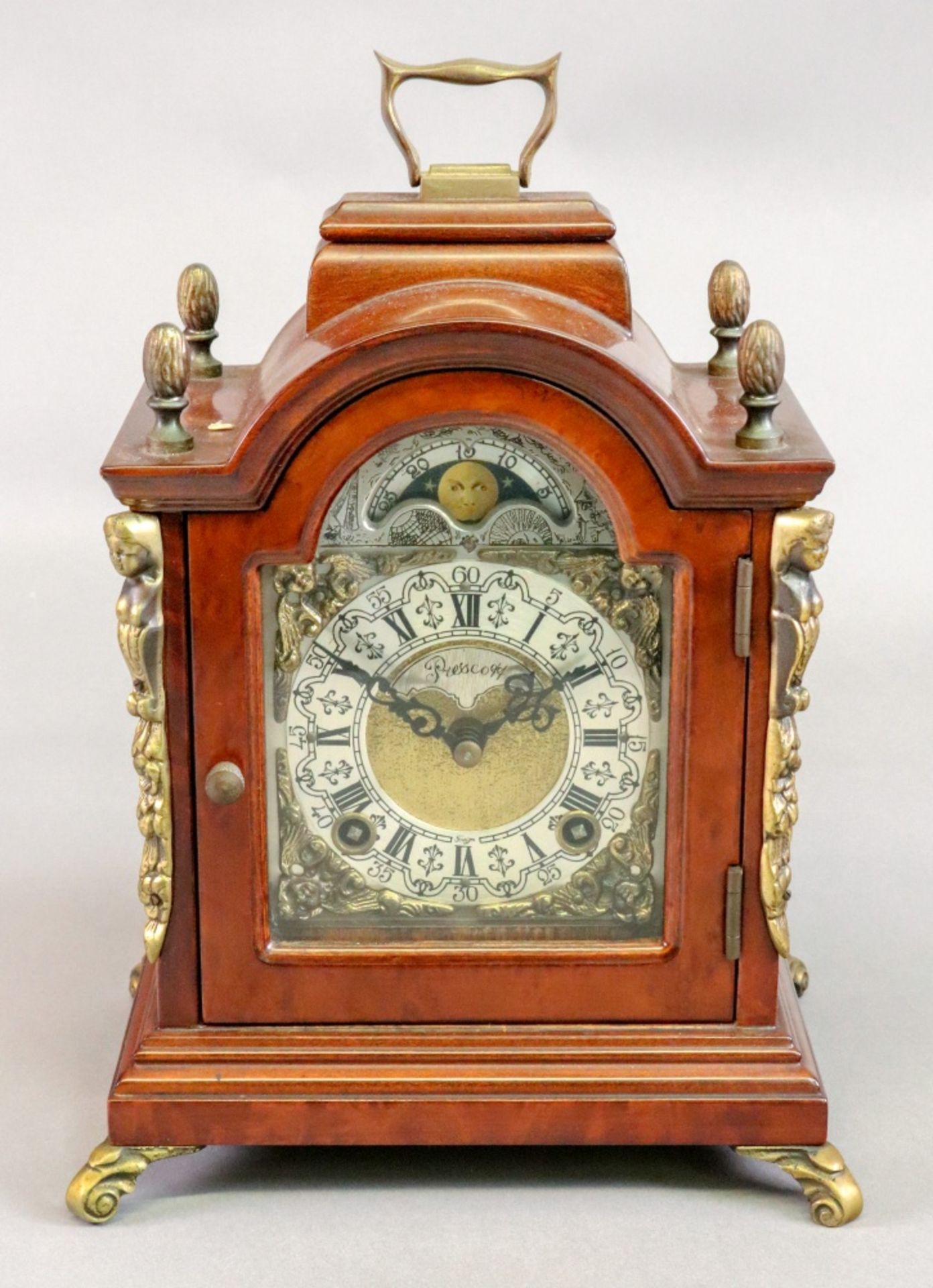 Prescott; a reproduction mid 18th century style mahogany gilt metal mounted miniature bracket clock,