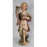 An Italian carved pine polychrome painted candlestick, 17th century,