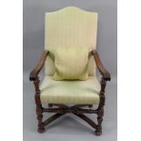 A walnut frame elbow chair, 17th century and later, reconstructed,