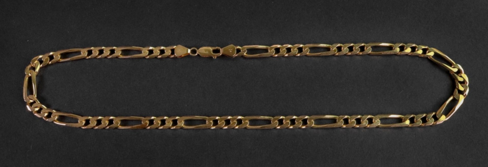 A 14ct gold flattened curb and elongated-link necklace, on a lobster clasp, detailed 'Italy 14k',