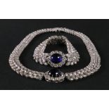 A silver, colourless paste and blue cabochon necklace and bracelet suite,
