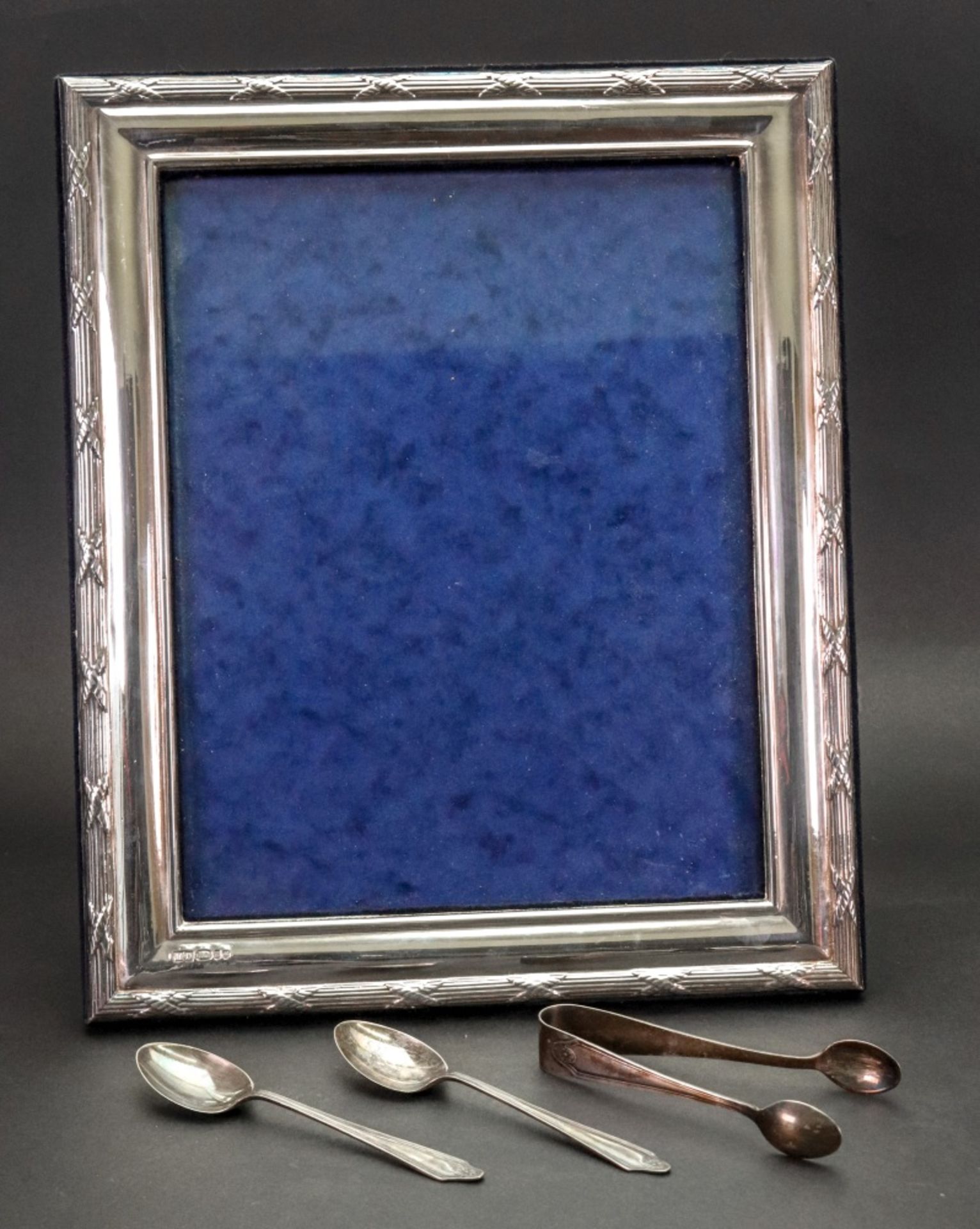 A modern large rectangular silver mounted photograph frame, millennium marks,