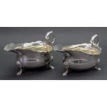 A pair of George II style silver helmet shape sauce boats, Edward Barnard & Sons, London 1928,