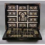 A 17th century North Italian ebony veneered and ivory table cabinet,