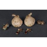 A collection of earrings, comprising: a pair of 9ct gold earstuds in the form of scallop shells, 9.