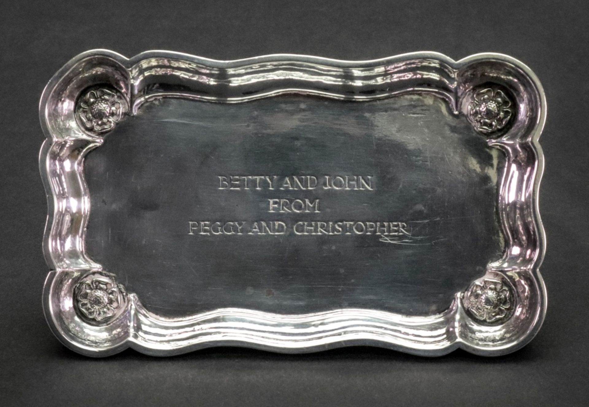 Omar Ramsden Me Fecit; a shaped rectangular silver dish, London 1937,