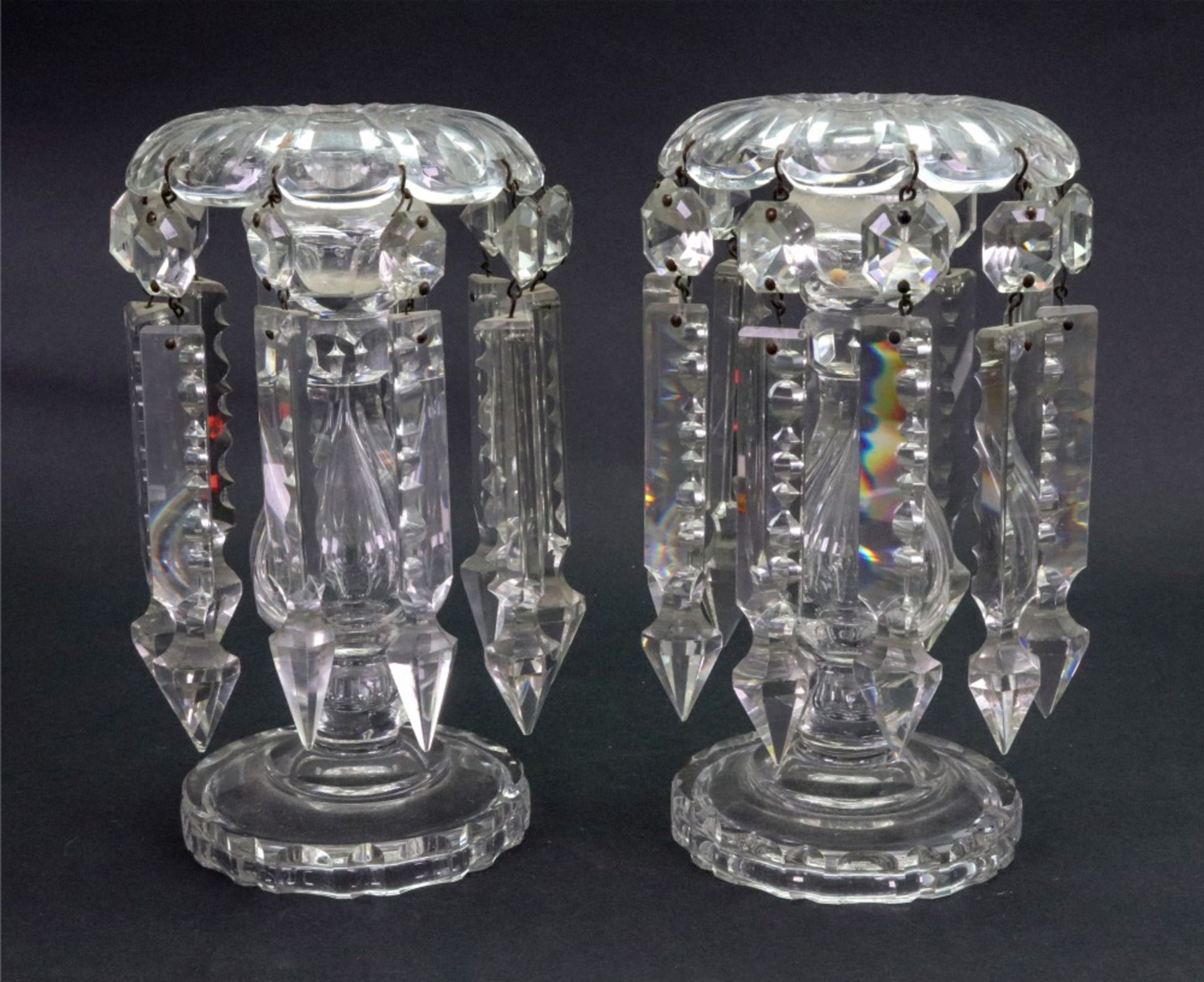 A pair of Regency style glass lustres, hung with faceted and spike shape drops,