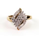 A modern marquise shaped cluster ring, c