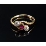 A 18ct gold, ruby and diamond three-ston