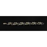 A silver fancy-link bracelet, designed a