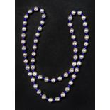 A cultured pearl and lapis lazuli single