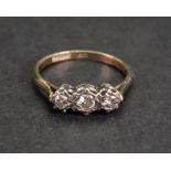 A 9ct gold and three-stone diamond ring,