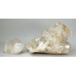 Natural history; a quartz crystal formation and another smaller, the first 45cm wide, (2).