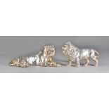 A silver model of a standing male lion (loaded),