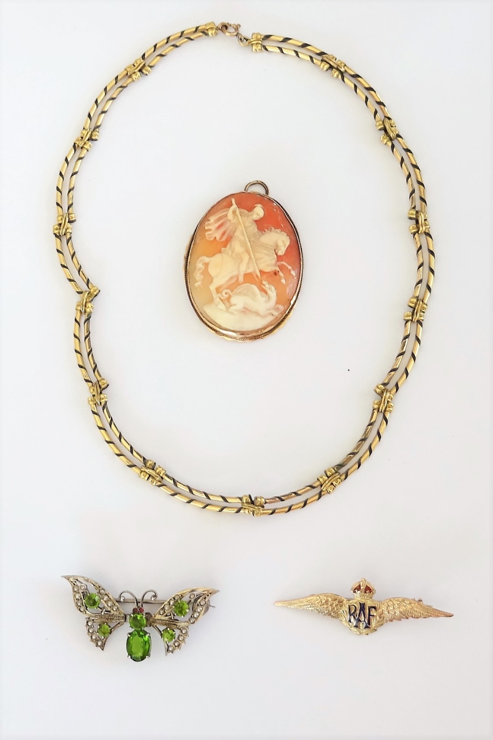 A group of jewellery, comprising; a necklace in a two row curved link design,