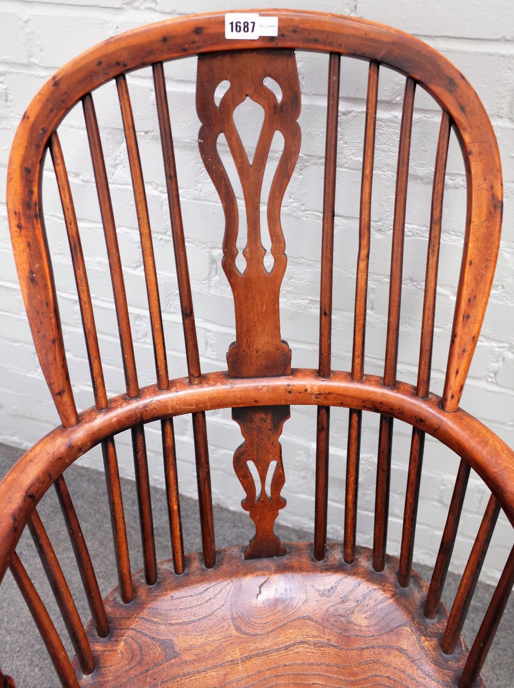 A 19th century yew and elm Windsor chair on turned supports united by crinoline stretcher, - Image 3 of 3