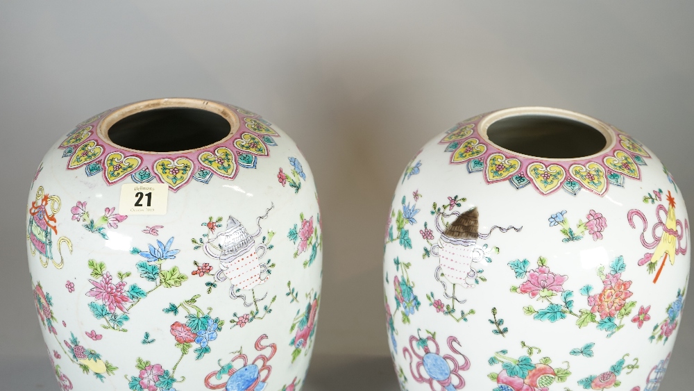 A pair of early 20th century Chinese vases, (lacking covers), decorated with Buddhist symbols, - Image 2 of 4