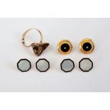 A set of four gold, mother-of-pearl and black enamelled octagonal dress buttons,