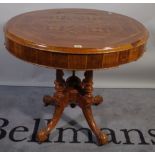 A Victorian specimen wood circular occasional table, on four outswept supports,