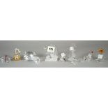 Swarovski; a group of ten figures comprising, a seahorse, a fish, an egg, a pineapple, a baby seal,