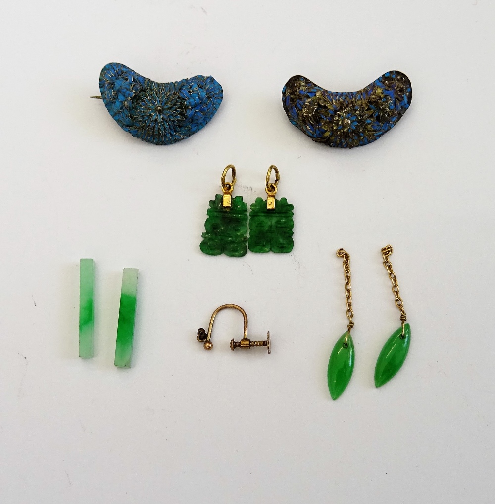 A pair of carved jade pendant drops, the tops detailed 585, two jade batons,