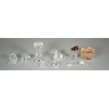 Swarovski; a group of eight figures comprising, a puffer fish, a candle, a lion,