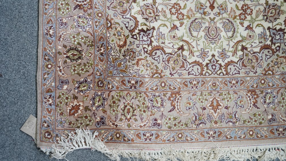 A fine part silk Esfahan rug, Persian, the ivory field with a brown shaped medallion, - Image 3 of 5