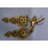 A 20th century gilt plaster figure of Putto, 30cm high,