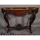 A 19th century continental walnut and kingwood serpentine console table base on four scroll