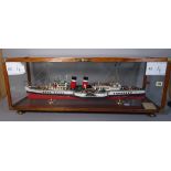 An early 20th century scratch built model of a paddle steamer, Waverley, in a glazed oak case,