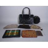 A quantity of early 20th century vintage purses and bags, (qty).