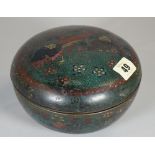 A Chinese cloisonné circular box and cover, the cover worked with two pheasants amongst flowers, (a.