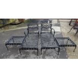 Forecast Furniture LTD; a pair of black painted metal sun loungers,