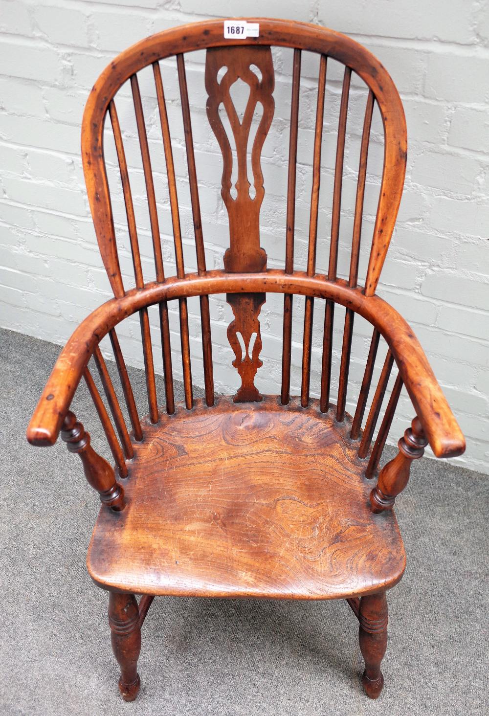 A 19th century yew and elm Windsor chair on turned supports united by crinoline stretcher, - Image 2 of 3