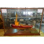 A large 20th century scratch built model of an Irish fishing boat Lyrie, in a glass case,