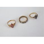 A Victorian 15ct gold, ruby and seed pearl set marquise shaped cluster ring,