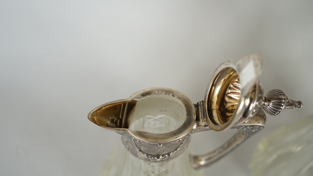 A copy of a pair of Faberge faceted glass claret jugs, each body of swept oval form, - Image 5 of 6