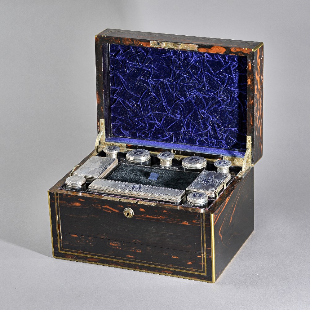 A Victorian corromandel wood travelling rectangular lady's toilet box,