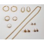 Mostly 9ct gold jewellery, comprising; three rings, a pair of smoky quartz single stone earstuds,